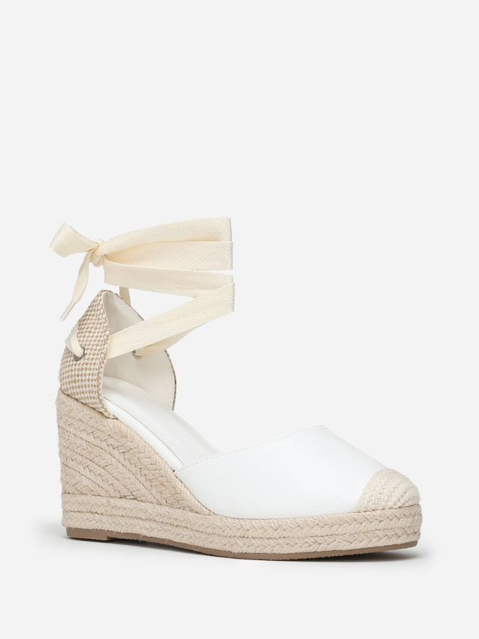 Espadrilles compensées blanches avec ruban à nouer
