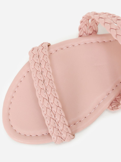 Sandales plates roses à fines brides tressées