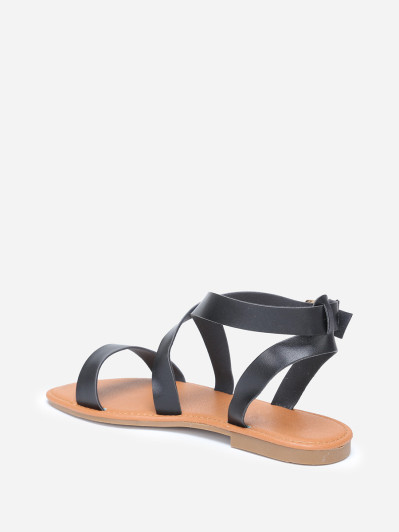 Sandales à brides noires avec boucle dorée