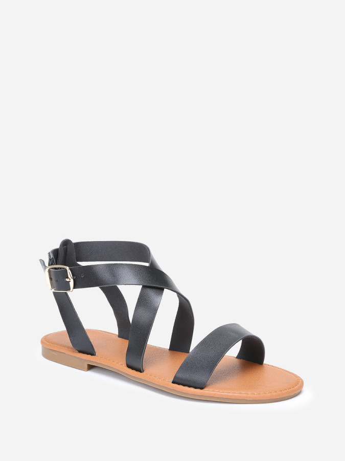 Sandales à brides noires avec boucle dorée