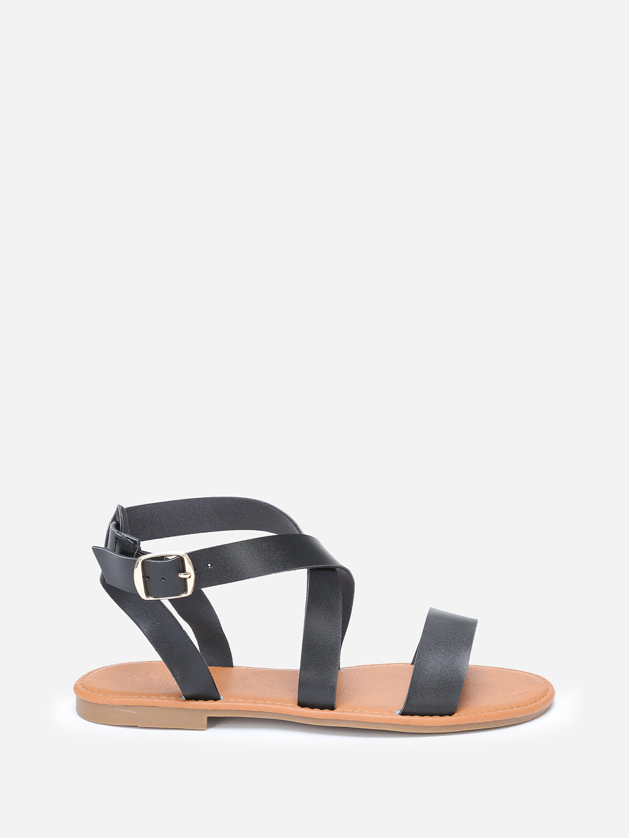 Sandales à brides noires avec boucle dorée