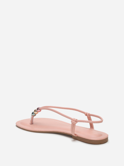 Nu-pieds roses à fines bride avec perles colorées