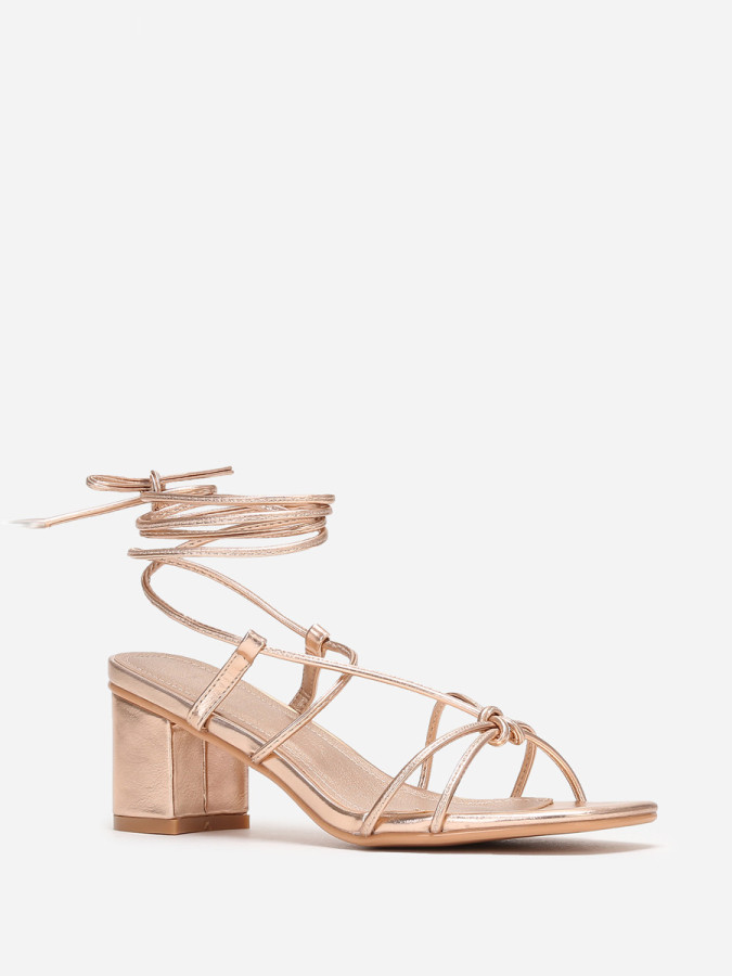 Sandales doré rose à brides entrelacées