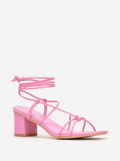 Sandales roses à brides entrelacées