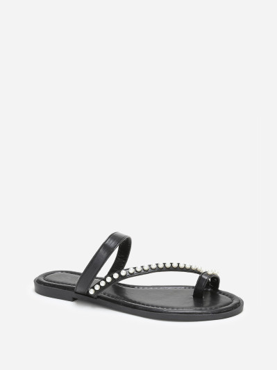 Mules plates noires à fines brides et perles