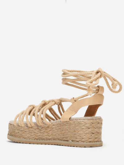 Sandales beiges à plateforme compensée et cordons
