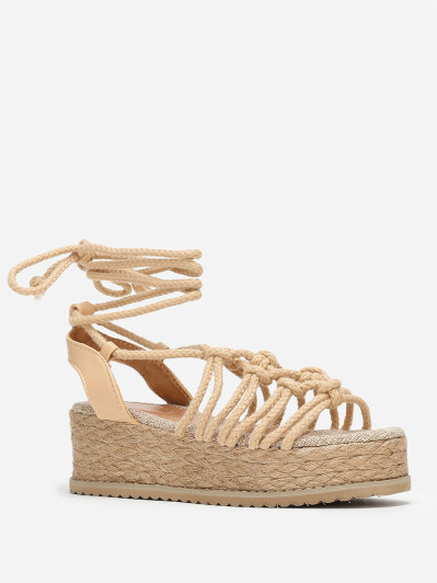 Sandales beiges à plateforme compensée et cordons