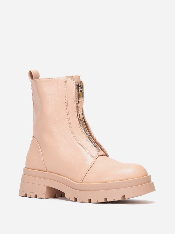 Bottines nude zippées à plateforme crantée