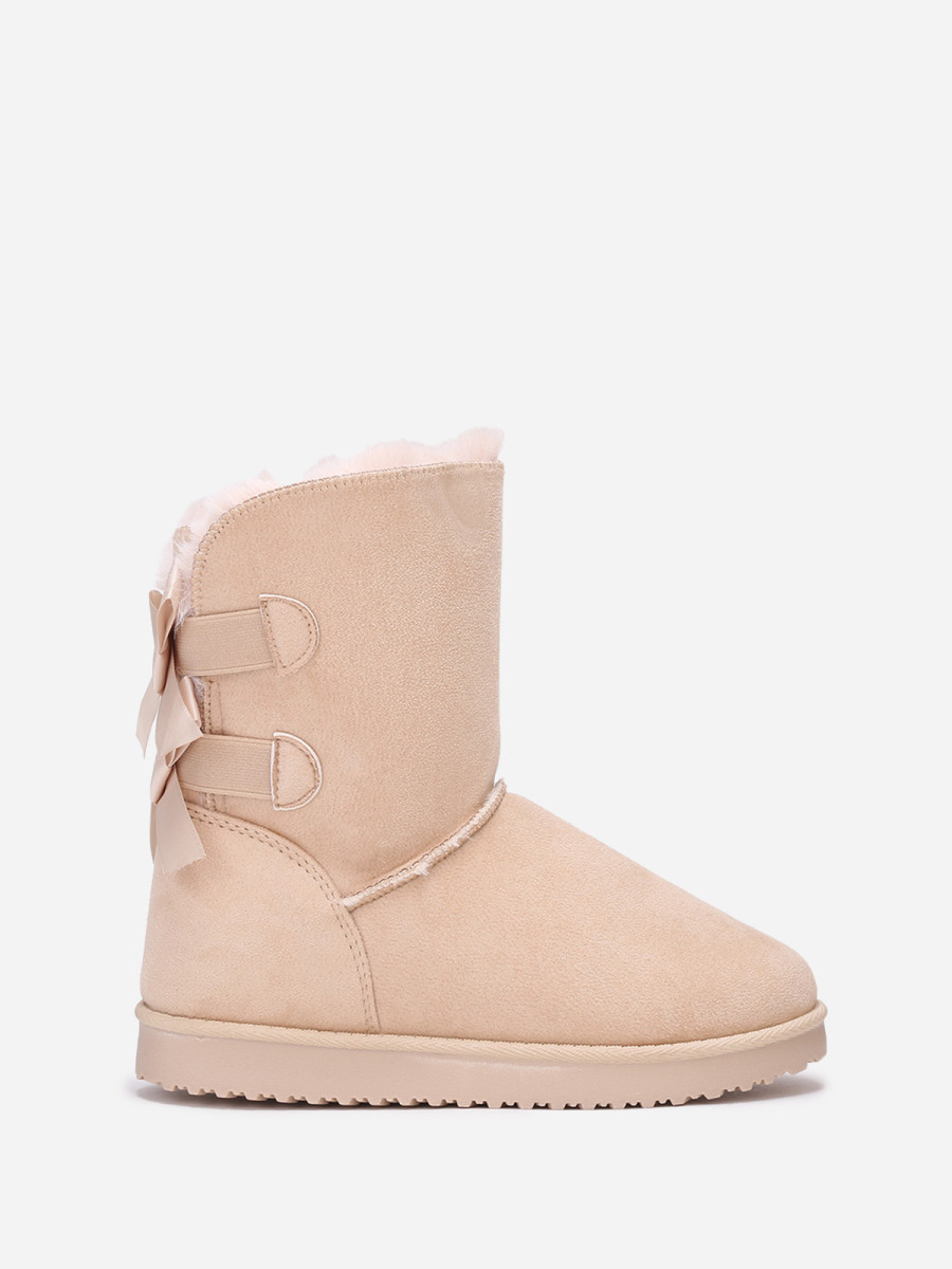 Boots fourrées en suédine à rubans