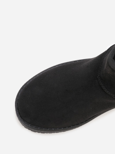 Boots basses en suédine fourrées