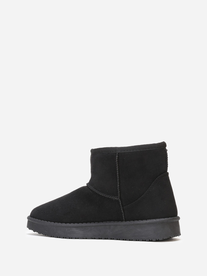 Boots basses en suédine fourrées