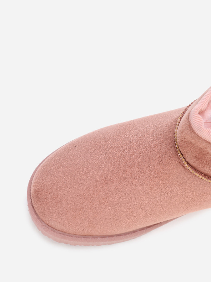 Boots basses en suédine fourrées