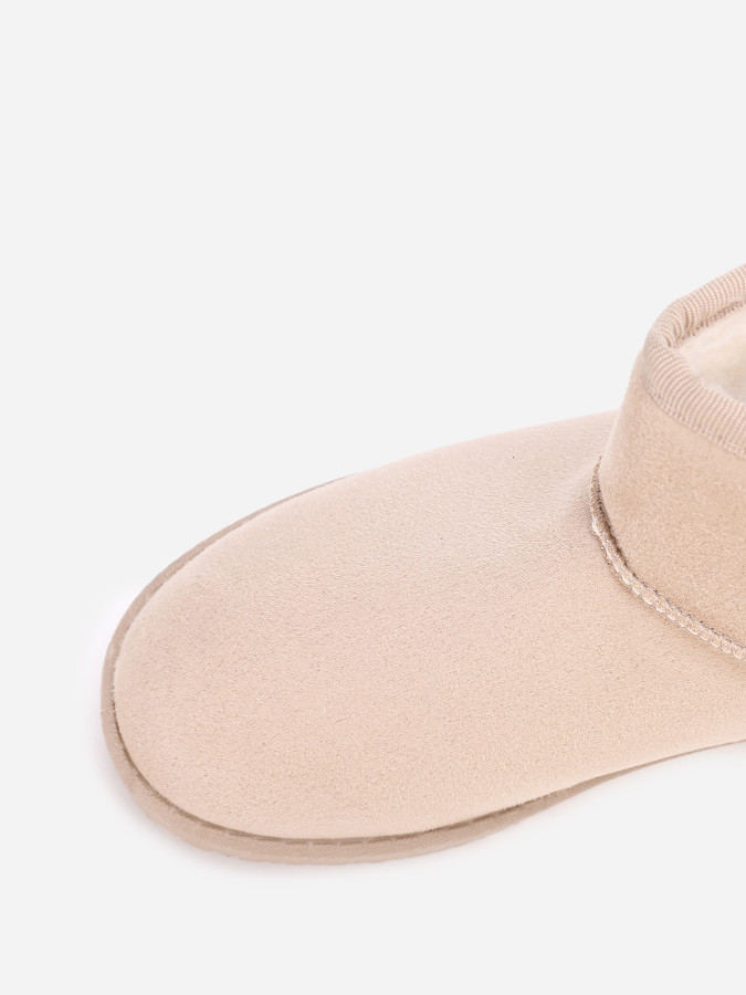 Boots basses en suédine fourrées