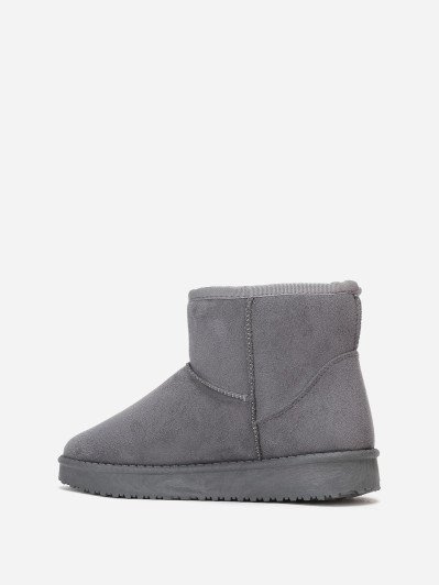 Boots basses en suédine fourrées