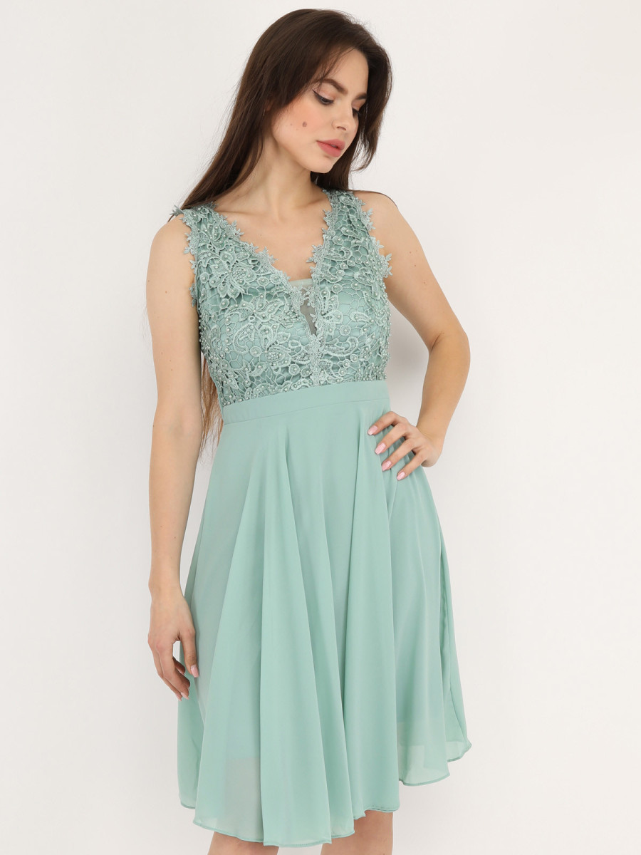 Robe patineuse avec broderie et perles