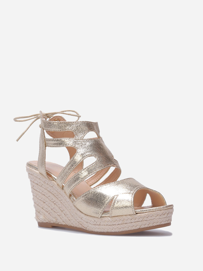 Sandales compensées à bride ajourée