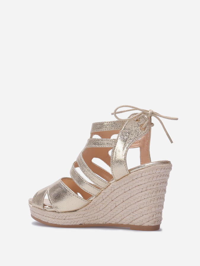 Sandales compensées à bride ajourée