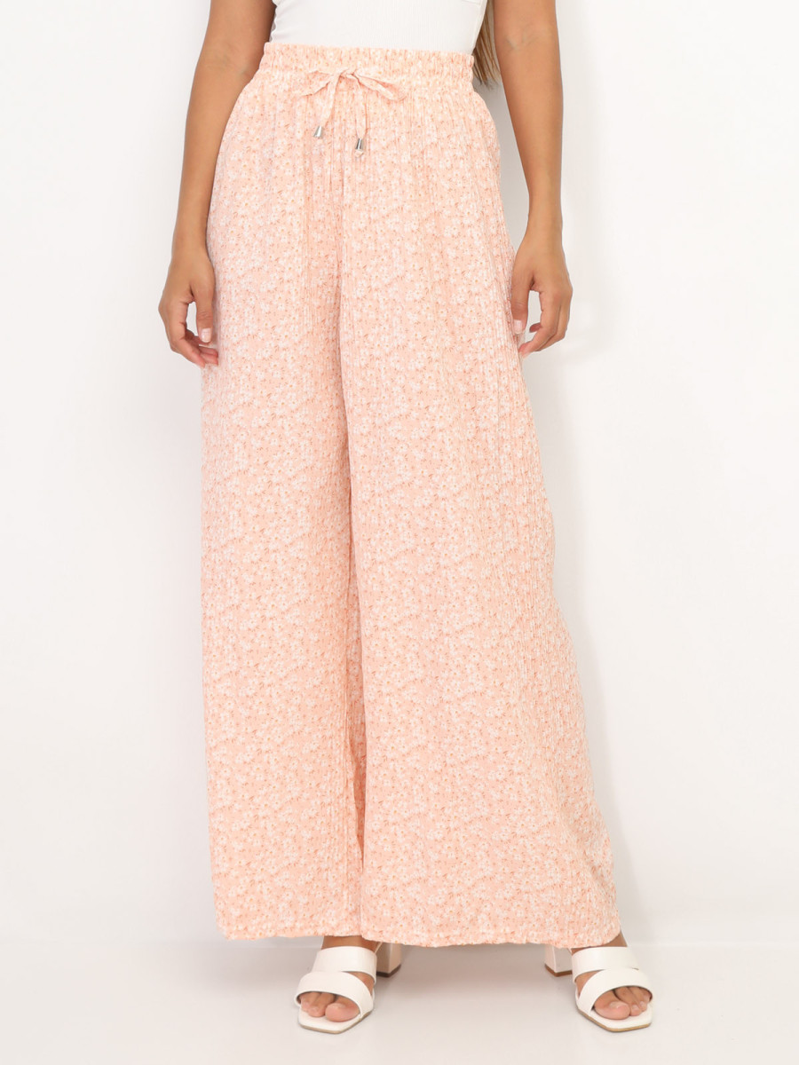 Pantalon plissé à motif floral