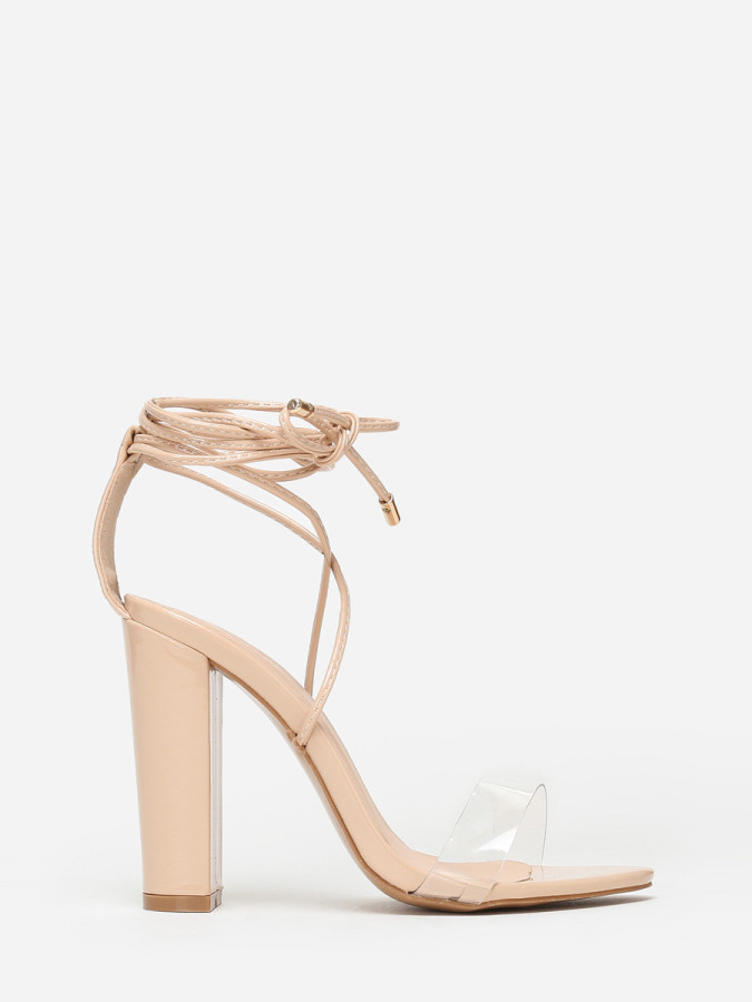 Sandales beiges avec bride transparente et lanière