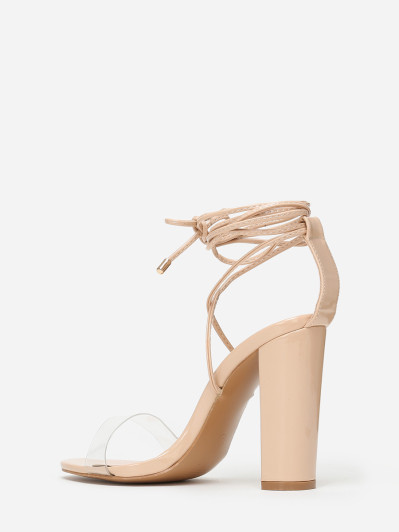 Sandales beiges avec bride transparente et lanière