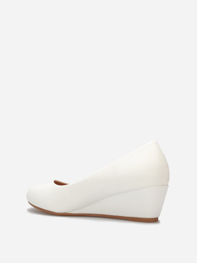 Ballerines compensées à bout rond