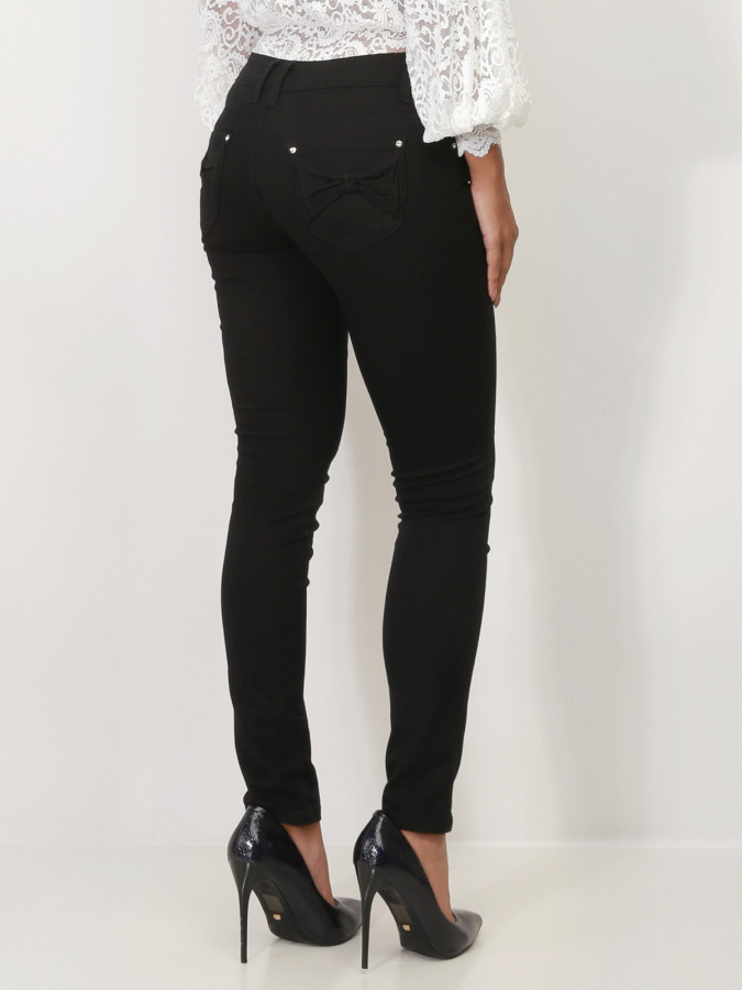 Jeans skinny noir avec noeuds sur les poches