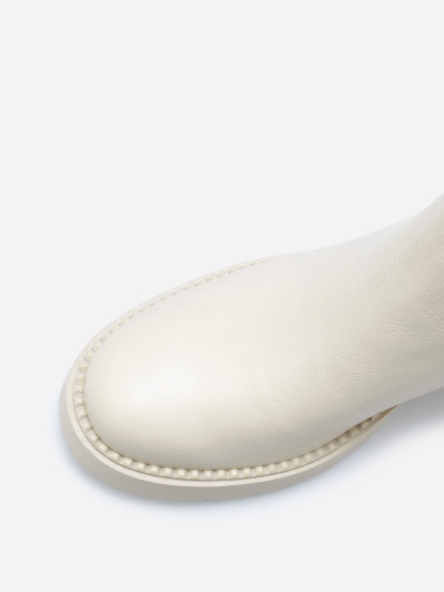 Bottines à talon et semelle crantés