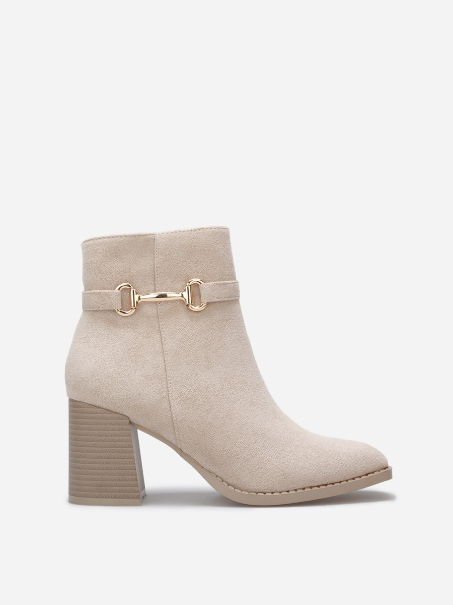 Bottines à talon en suédine avec mors doré