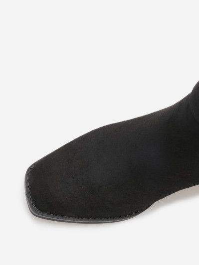 Bottines à talon en suédine avec mors doré