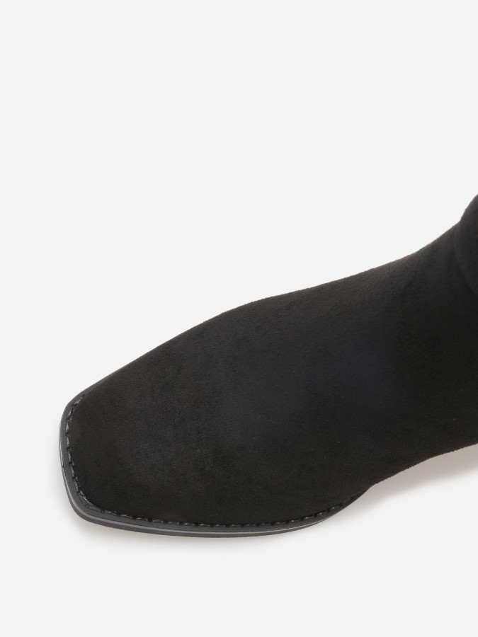 Bottines à talon en suédine avec mors doré