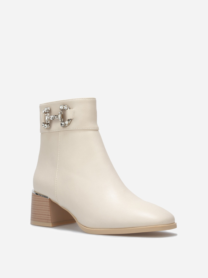 Bottines à bout carré et mors serti