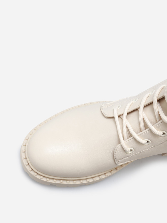 Bottines rangers à semelle crantée