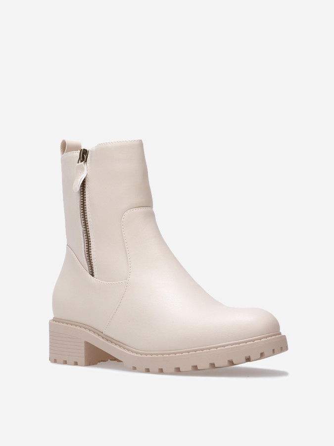 Bottines à empiècements et zip décoratif