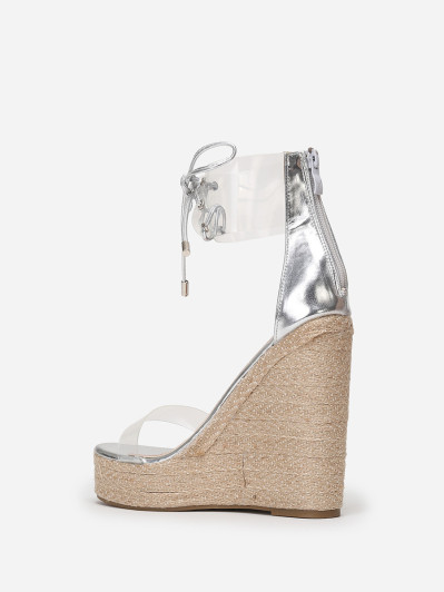 Sandales compensées argentées à brides transparentes