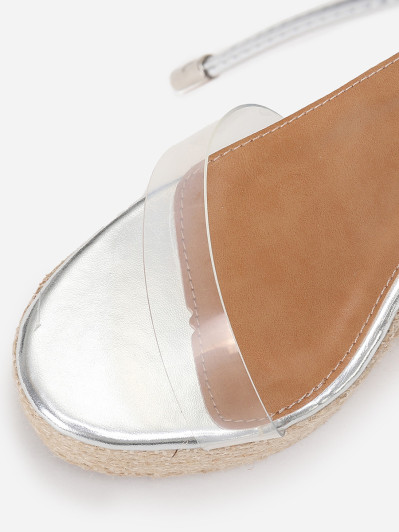 Sandales compensées argentées à brides transparentes