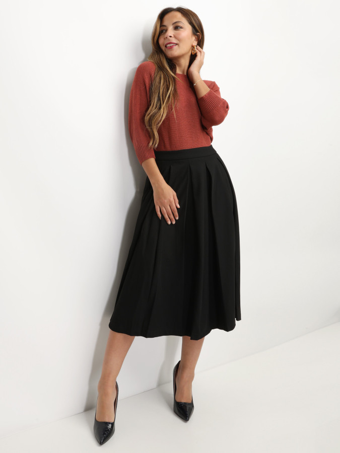 Jupe mi-longue évasée et plissée