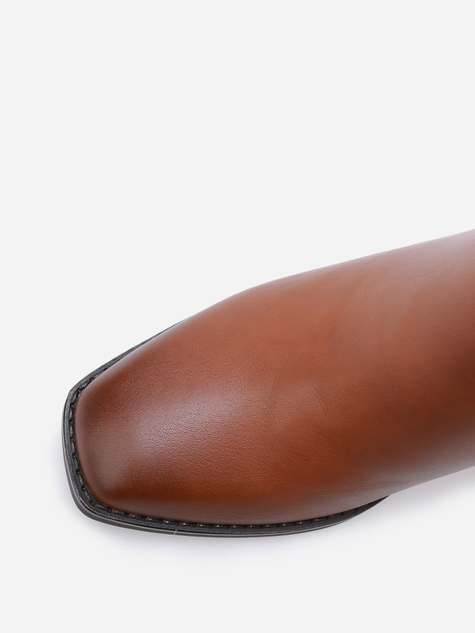 Bottines à talon carré et mors doré