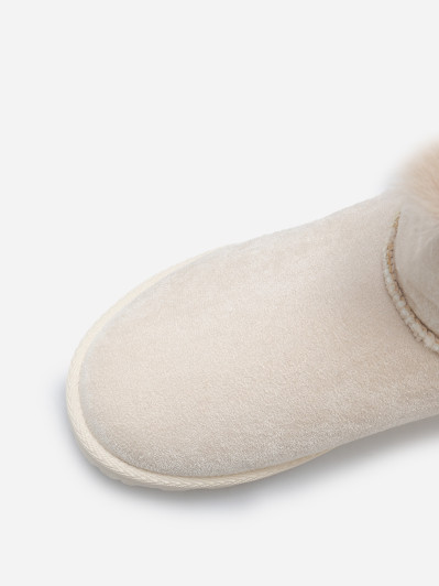 Boots en suédine fourrées à ruban noué