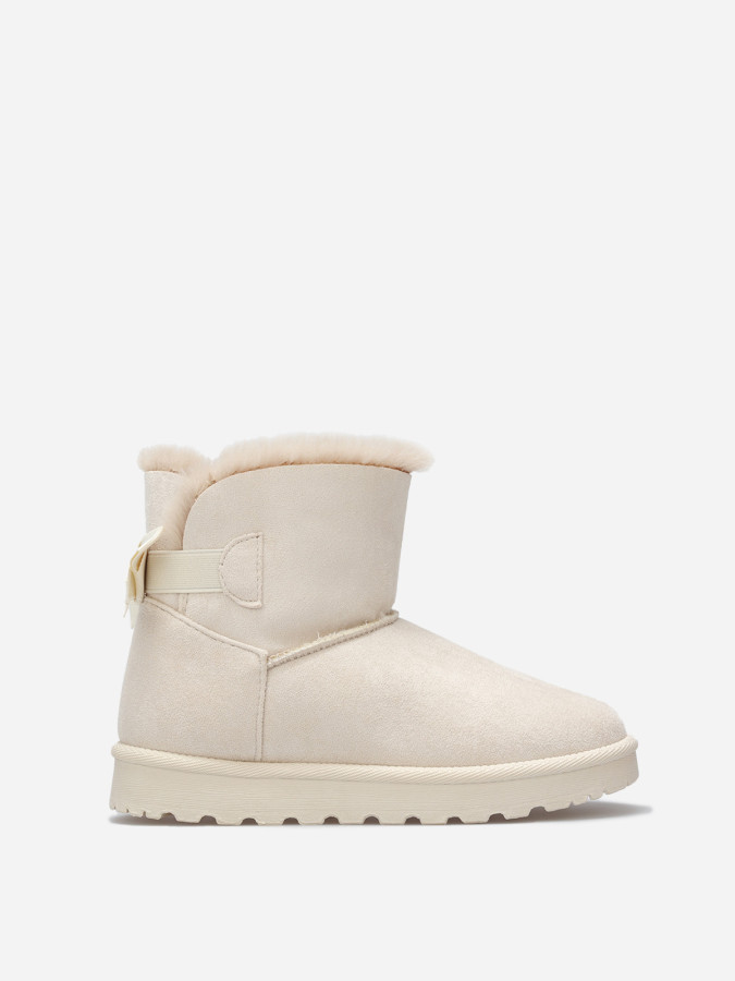 Boots en suédine fourrées à ruban noué