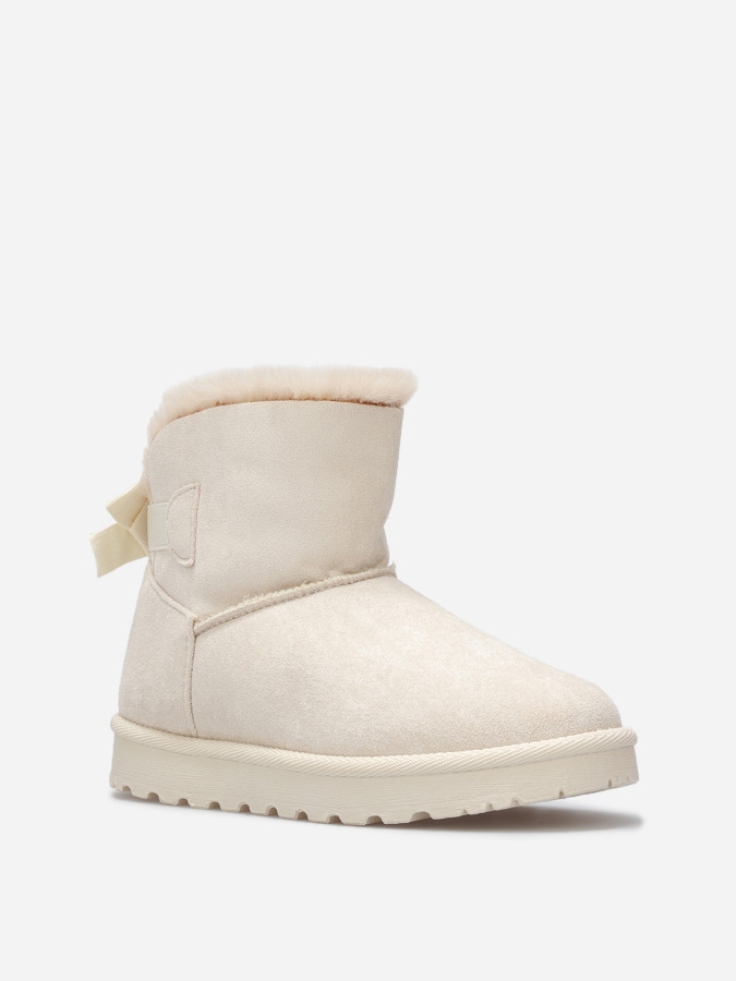 Boots en suédine fourrées à ruban noué