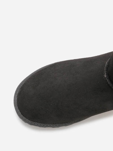 Boots en suédine fourrées à ruban noué