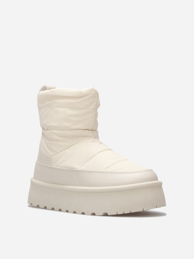 Boots matelassées et fourrées à plateforme