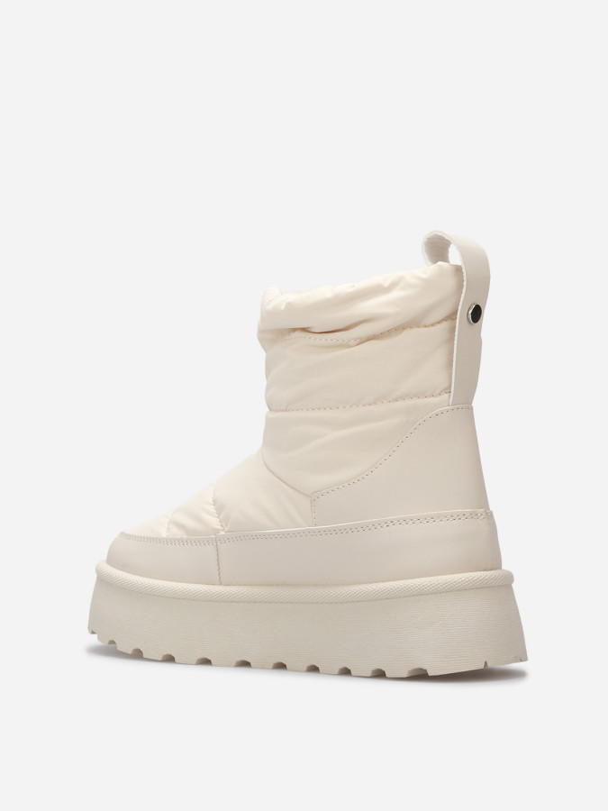 Boots matelassées et fourrées à plateforme