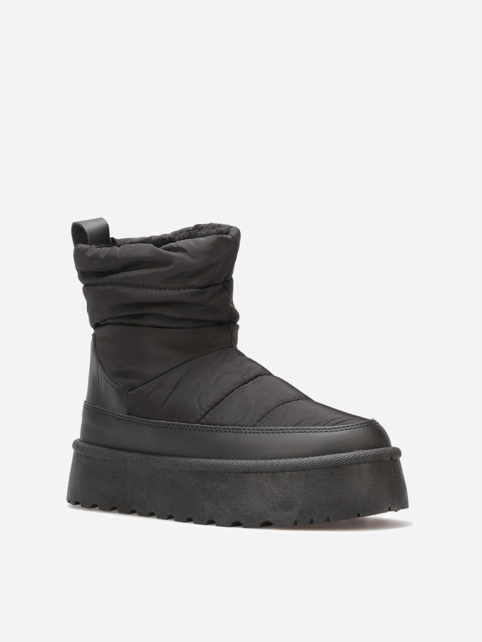 Boots matelassées et fourrées à plateforme