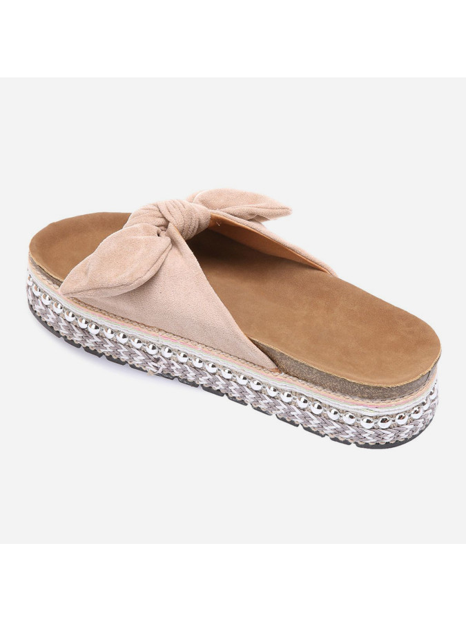 Mules nudes à noeud et semelle à motifs