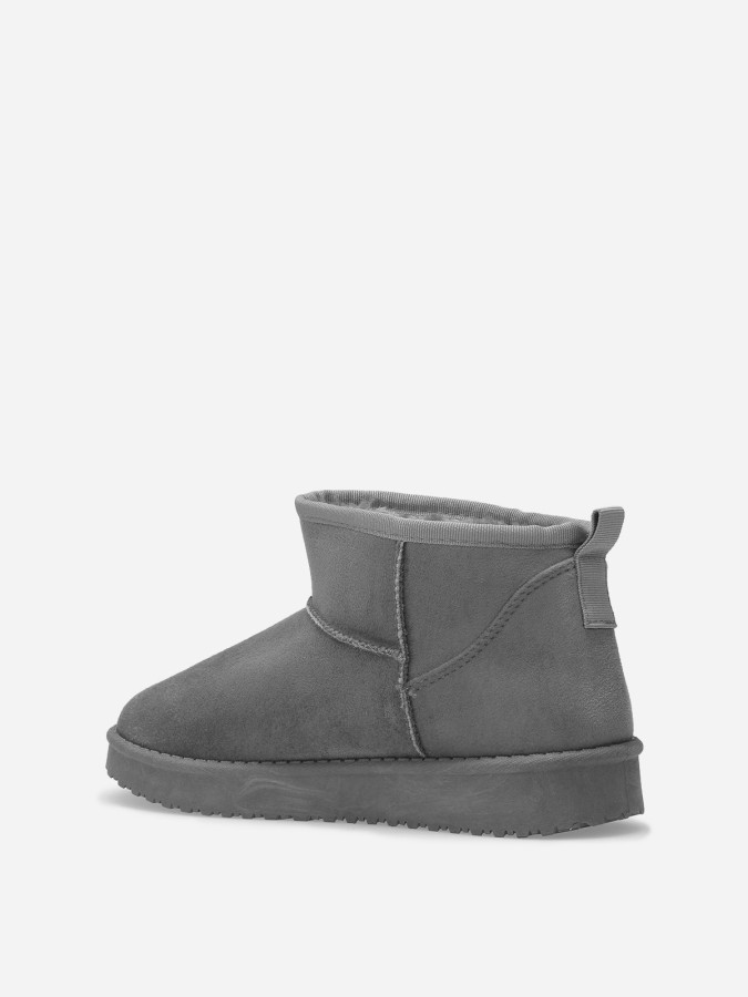 Boots basses en suédine fourrées