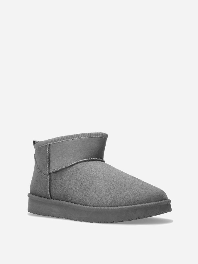 Boots basses en suédine fourrées