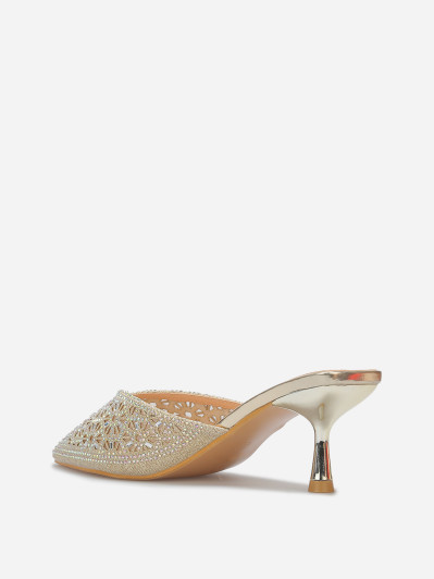 Mules pointues et ajourées à strass