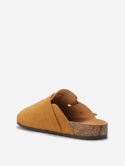 Mules en suédine avec bride