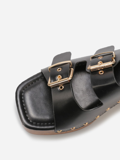 Mules sabots à boucles et clous